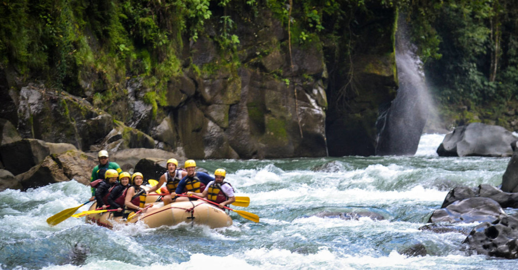 Large group of people white water rafting in Costa Rica